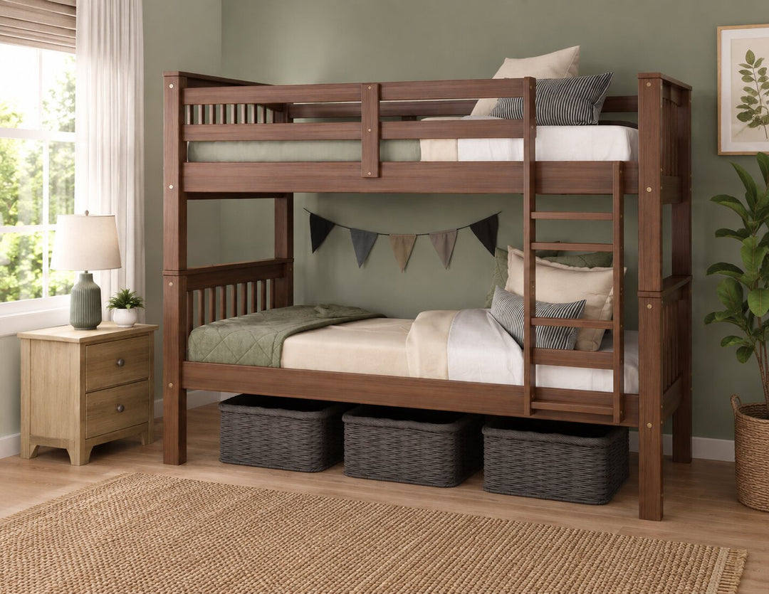A brown wooden mocha colored bunk bed with a ladder, styled in a bedroom with a green wall, a wooden nightstand, a lamp, a plant, and three storage baskets underneath.